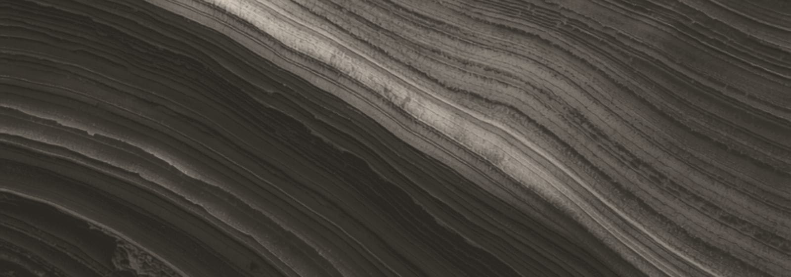 Stone & Pillar strata artwork, plate 23: layered rock in warm stone, the colour this site uses for planning & development matters.